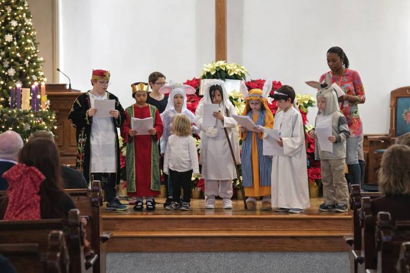 The children performing the Christmas pageant in the sanctuary